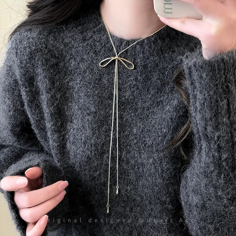 Silver Bow Pendant Necklace