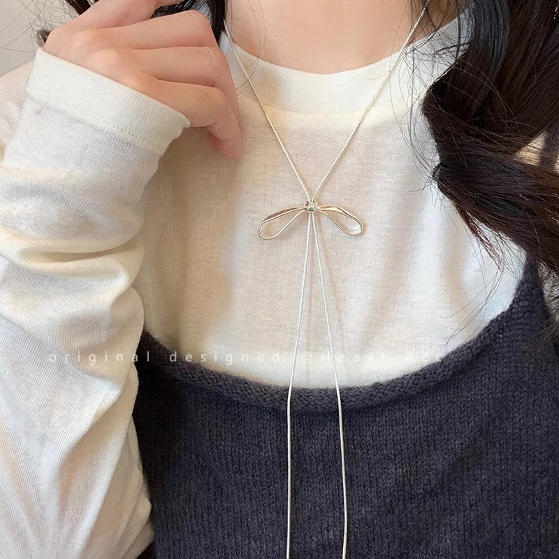 Silver Bow Pendant Necklace