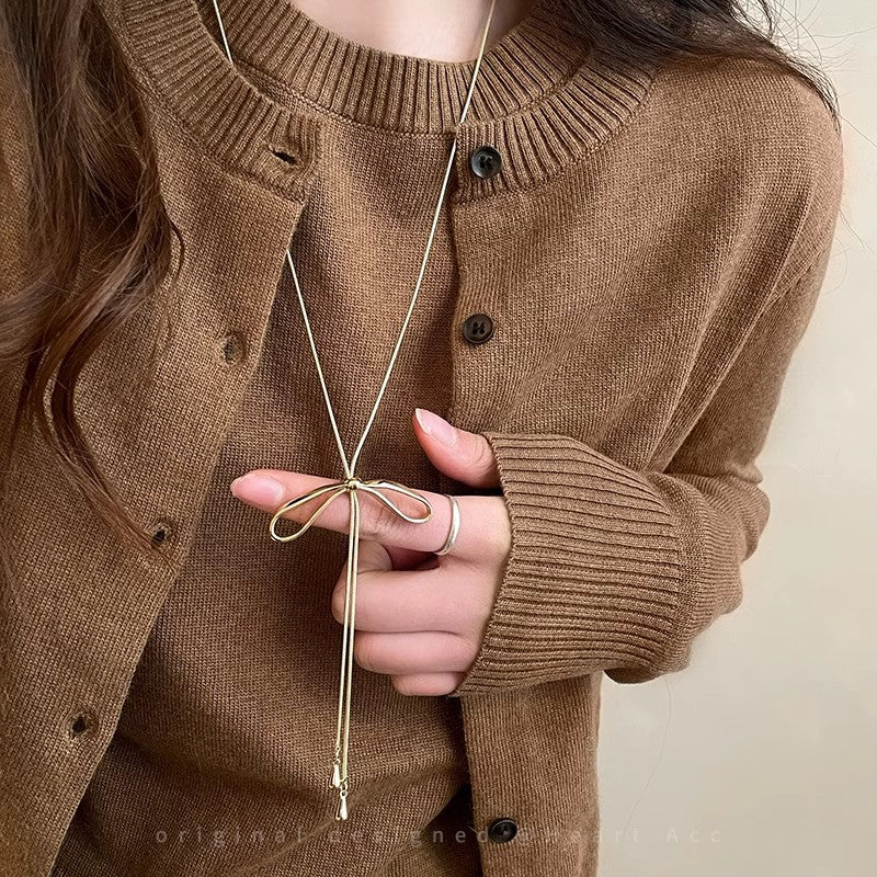 Silver Bow Pendant Necklace